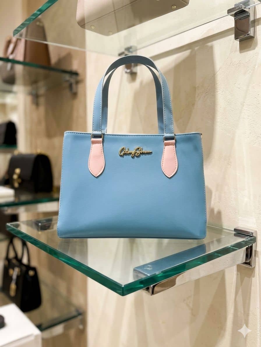 Bolsa belíssima, na cor azul com rosé
