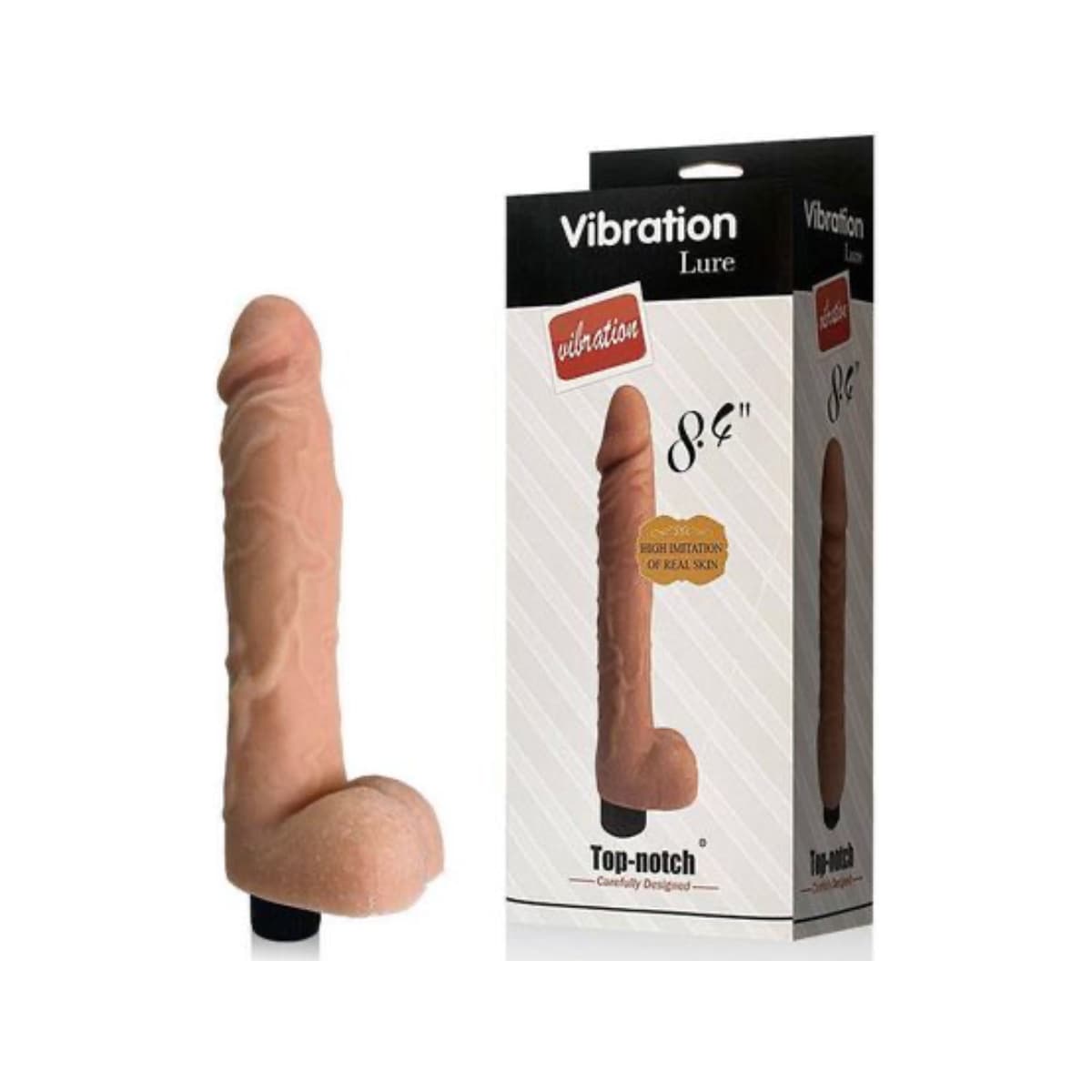 Protese com vibração, glande saliente e escroto. Produto: 21x3,5 cm. Material: ABS e TPE