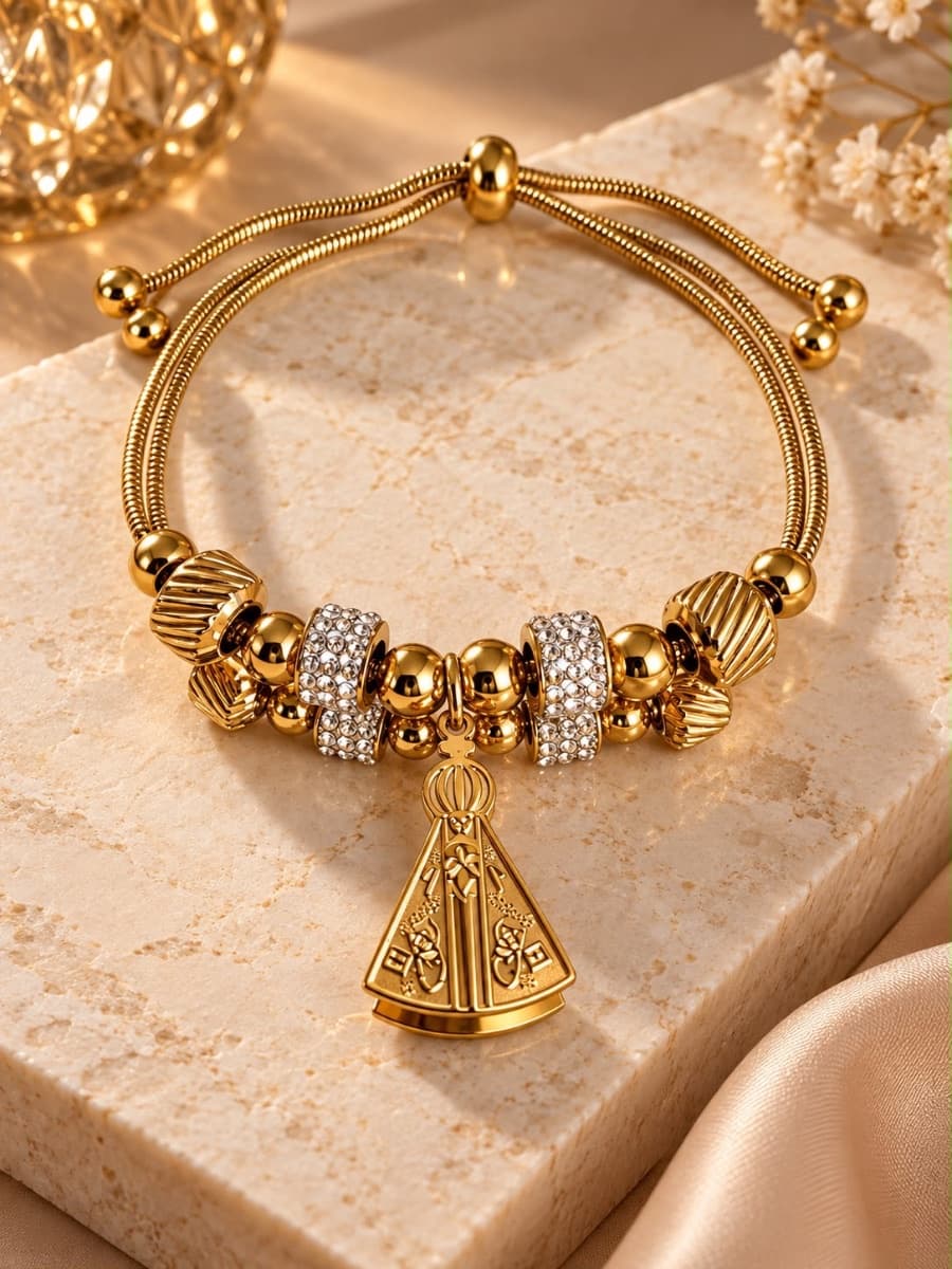 Pulseira dourada com pedraria nossa senhora
